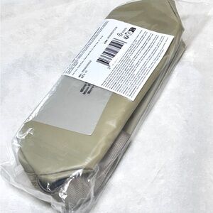 Burberry Beige cosmetics bag.